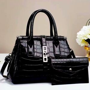 Luxury handbag with mini makeup bag